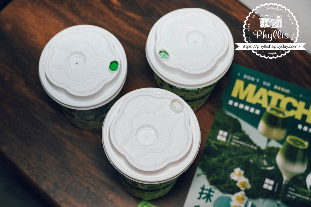 UG桃園龍潭店飲料杯蓋上方特寫，外帶手搖飲杯身與品牌細節設計